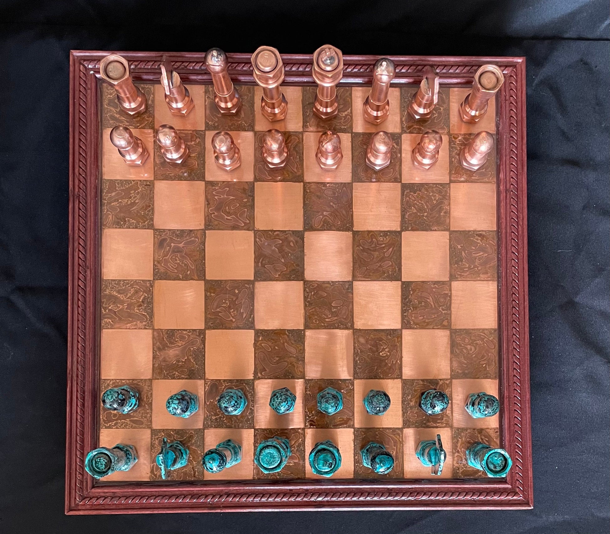 An image of a Copper Rosewood Chess Set with a view from the top.